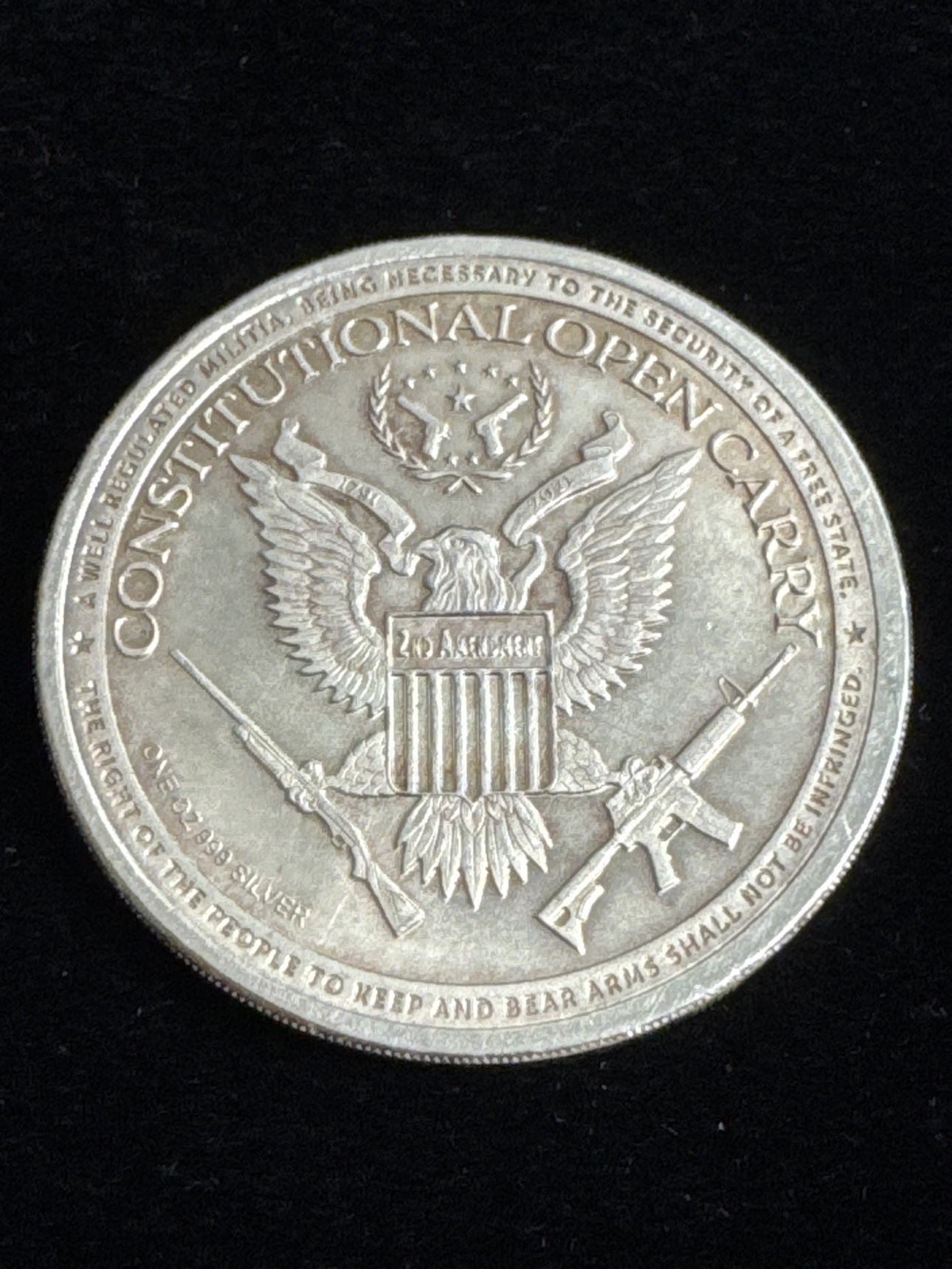 Constitutional open carry side of the one-ounce .999 fine silver Texas round