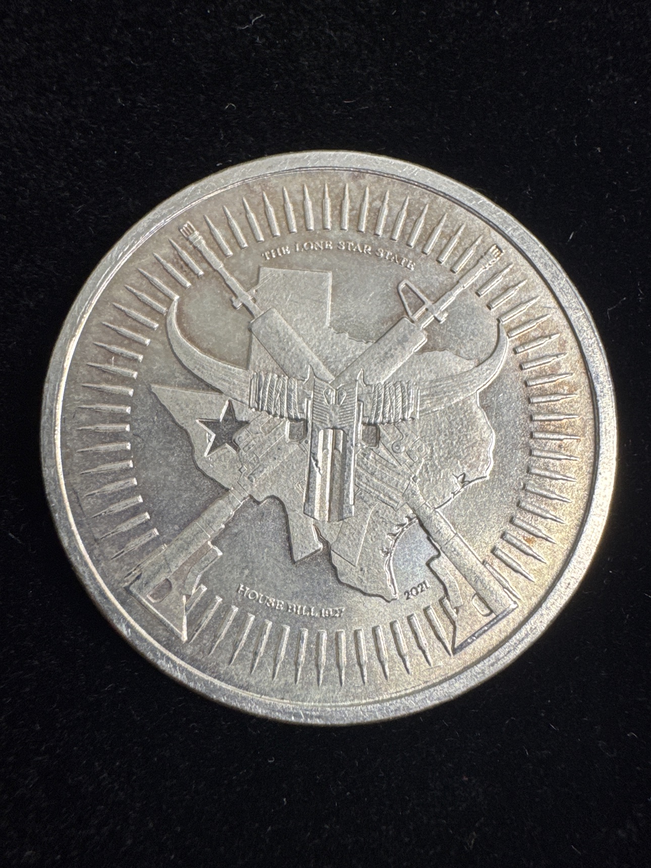 Texas House Bill 1927 side of the one-ounce .999 fine silver round
