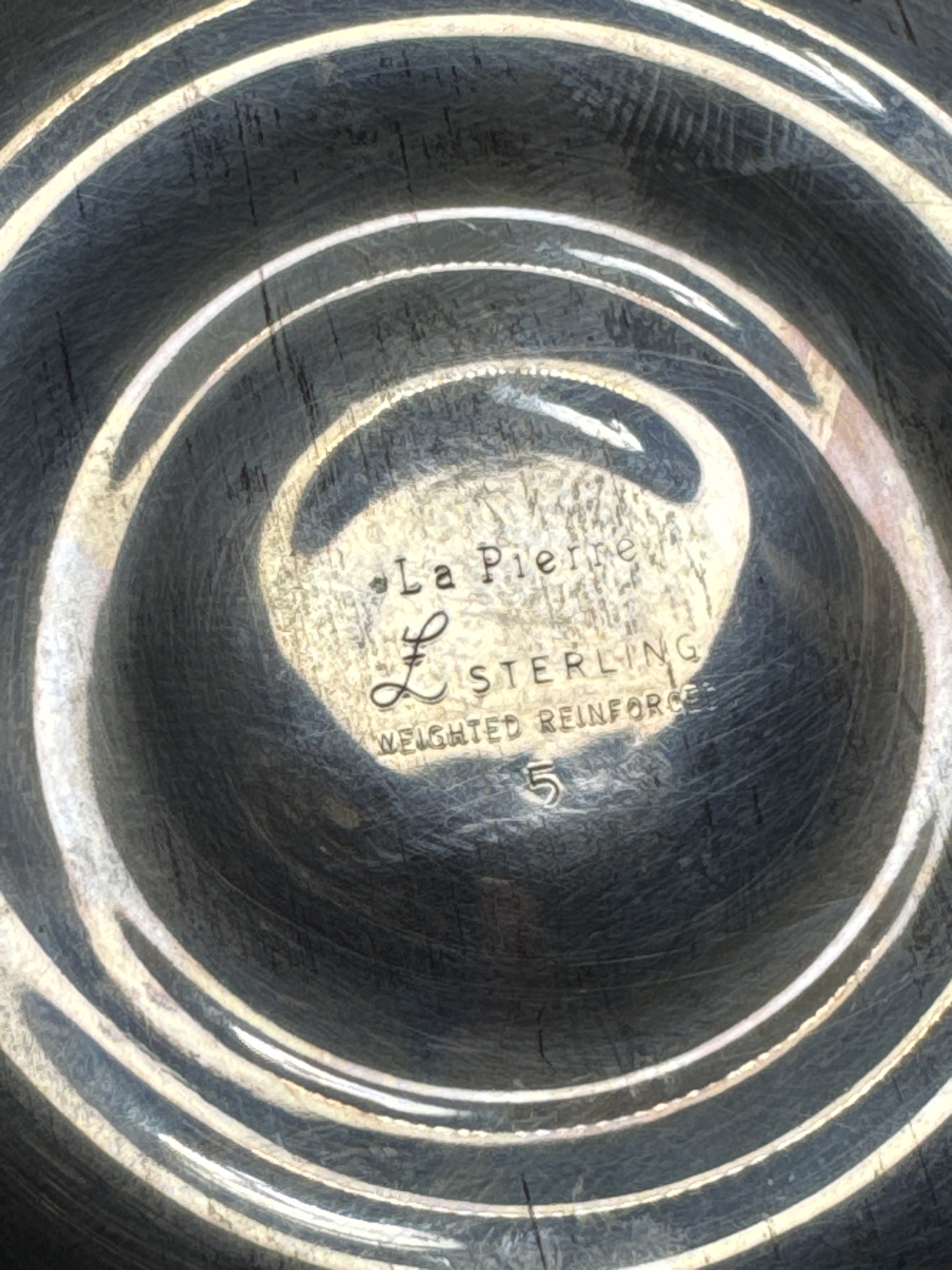 Close-up of the La Pierre Sterling Weighted Reinforced maker's mark